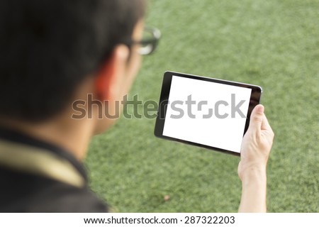 Man showing blank tablet isolated
