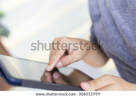 Woman Using Tablet: Close Up
