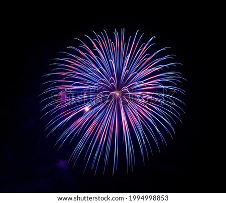 Blue fireworks in dark background, Malta fireworks festival,4 of July,Independence day, explode,blue purple violet fireworks isolated in dark background with the space for text.Fireworks in Mqabba jun