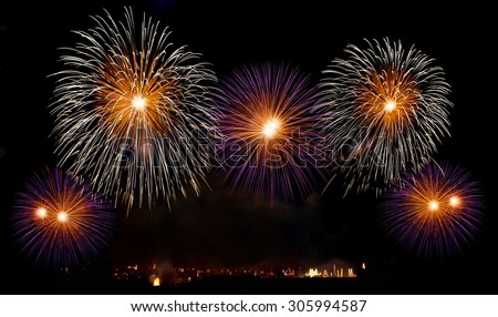 Big colorful fireworks explode in Malta in dark sky,Malta fireworks festival, 4 July, Independence, fireworks explode, New Year, fireworks in Zurrieq isolated in dark background with place for text