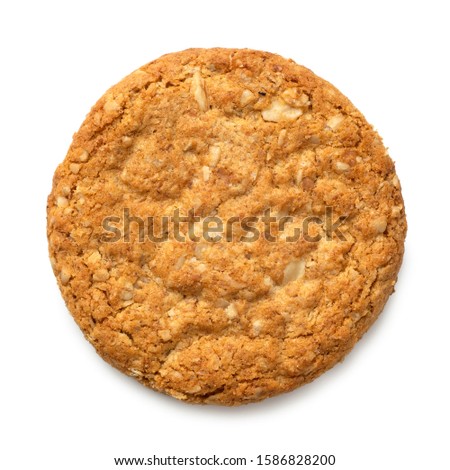 Crunchy oat and wholemeal biscuit isolated on white. Top view.