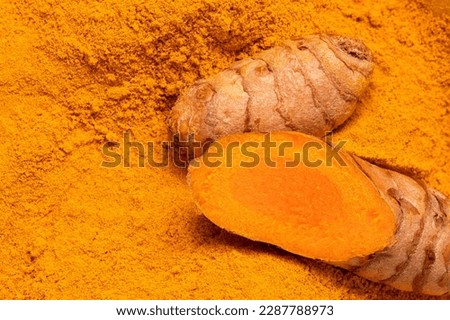 Image, Stock Photo Turmeric roots and powder in a white bowl on a grey wooden table. Close up. Spice.