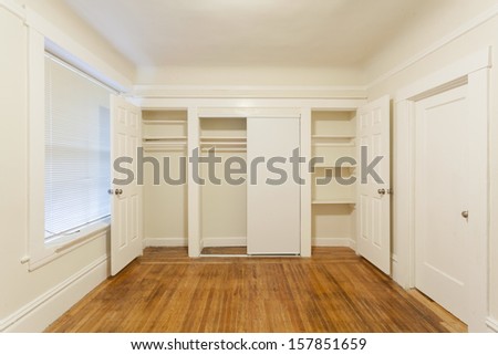 An empty closet in an empty studio apartment