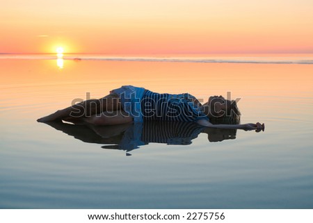 Dirty dreams on water and beautiful sunset.