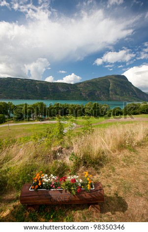 Flower bed and norwegian landscape in Urnes (Ornes), Norway, Scandinavia