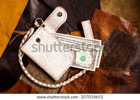 leather wallet on  leather background.