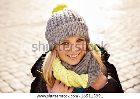 Pretty young woman in winter clothes