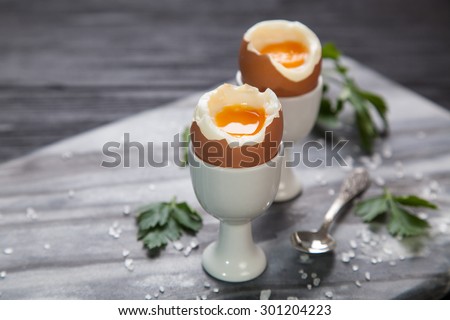 Fresh boiled eggs on marble background