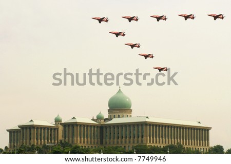 The Red Arrows pass by Malaysia\'s Administrative Office