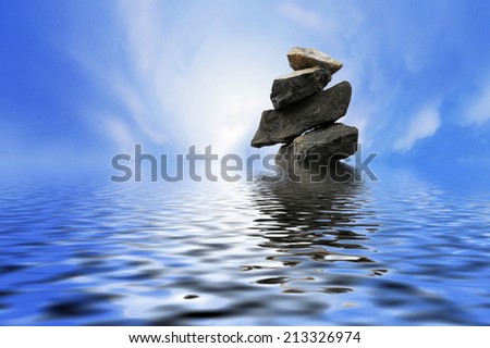 minimalist conceptual stacking stones in the middle of ocean. digital compositing with colour tone, water reflection and ripple effects.