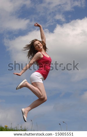 Very Attractive Teenager Jumping for Joy