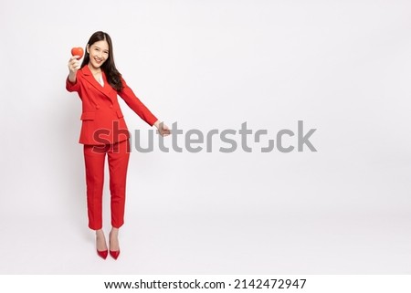 Image, Stock Photo woman with red heart shaped cardboard in her eyes smiling.