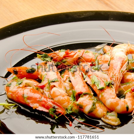 dish of fried prawns with herbs and spices