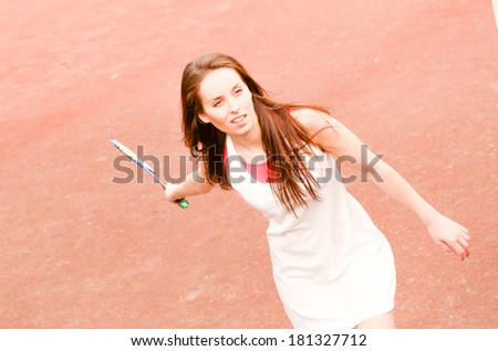 Fitness, young, sport woman playing badminton on playground for leisure time activities