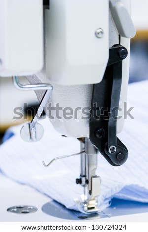 Sewing machine in tailor shop.