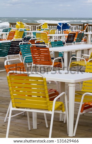 Empty patio with multi color chair.