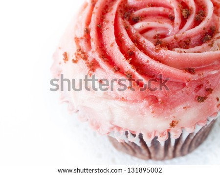 Gourmet red welveet cupcake on white background.