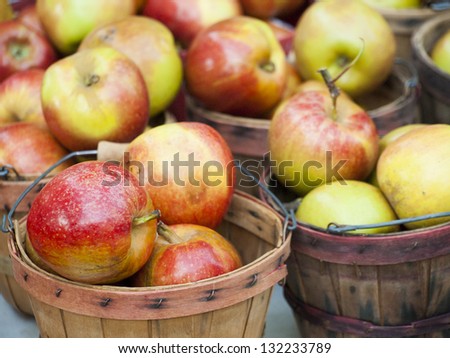 Fresh apples at the local farmers market. Farmers markets are a traditional way of selling agricultural products.