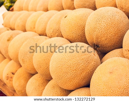 Fresh cantaloupe at the local farmers market. Farmers markets are a traditional way of selling agricultural products.