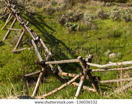 Split rail fence in rural area.