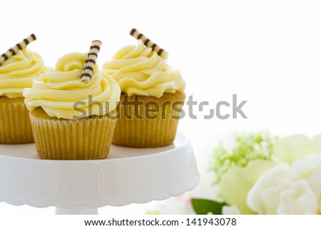 Small white chocolate cupcakes at desesrt bar.