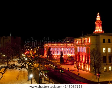 Downtown Denver at Christmas. Denver\'s City and County building decorated with holiday lights.