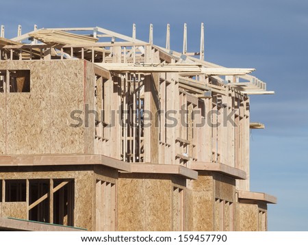 Townhome construction with wood framing.