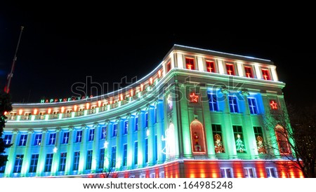 Downtown Denver at Christmas. Denver's City and County building decorated with holiday lights.
