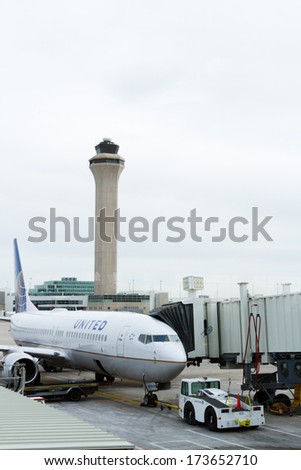 Denver, Colorado-March 29, 2013: Parked airplane at the terminal.
