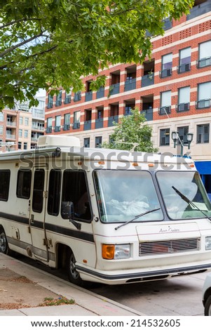 Denver, Colorado, USA-August 31, 2014. Motorhome parked on the street of downtown Denver.