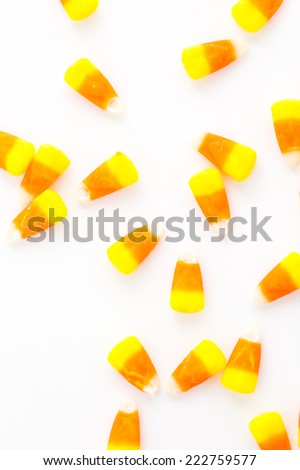Candy corn candies on a white background.