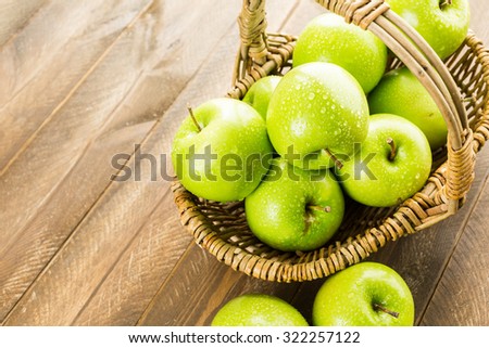 Organic Granny Smith apples on the table.