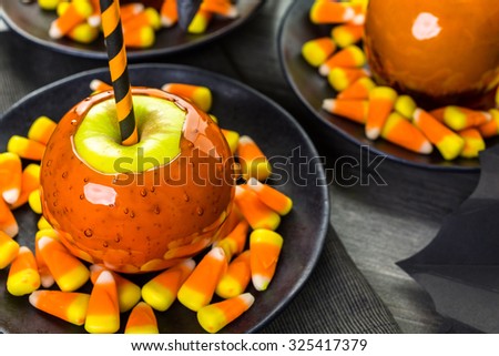 Handmade orange candy apples for Halloween.