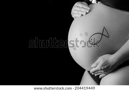 maternity belly with painted fish