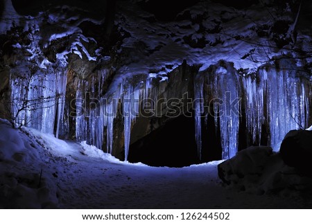 Entrance to ice cave with plenty of icicles