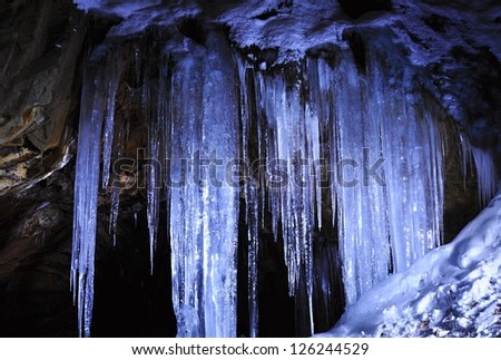 Large Ice Cave with large blue ice stalactites