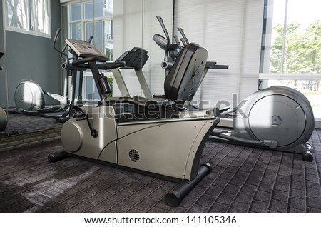 elliptical cross trainer and  treadmill in club house