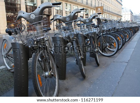 PARIS - MARCH 7: Rental bikes of the bicycle sharing system Velib\' in the center of Paris, France on March 7, 2011.