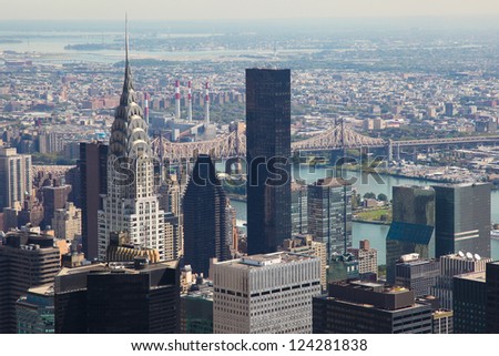 Skyline of Manhattan in New York City, United States, with the Empire State Building and Brooklyn Bridge