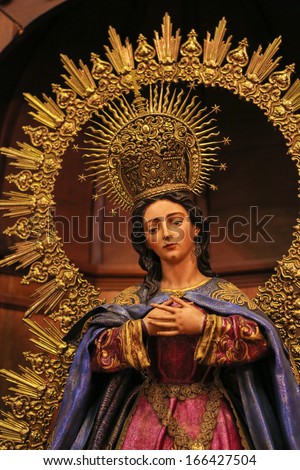 RONDA, SPAIN - DEC 1: Famous statue of Mother Mary, in the church of Ronda, Spain, on December 1, 2013.