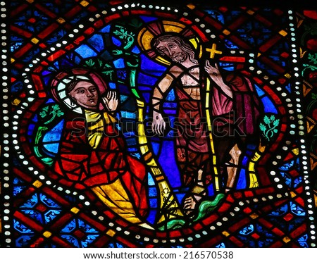 LEON, SPAIN - JULY 17, 2014: Stained glass window depicting the resurrected Jesus and Mother Mary in the cathedral of Leon, Castille and Leon, Spain.