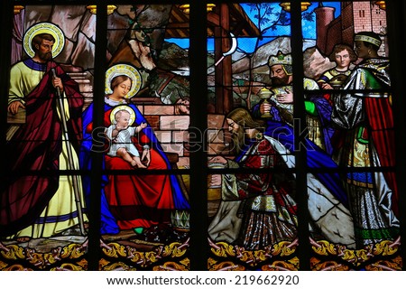 TOURS, FRANCE - AUGUST 8, 2014: Stained glass window depicting the Epiphany, the Visit of the Three Kings in Bethlehem, in the Cathedral of Tours, France.