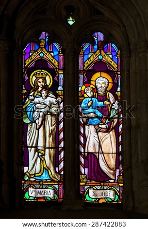 RONDA, SPAIN - DECEMBER 1, 2013: Stained Glass depicting Mother Mary and Saint Joseph, Jesus\' parents, in the Church of Ronda, Spain
