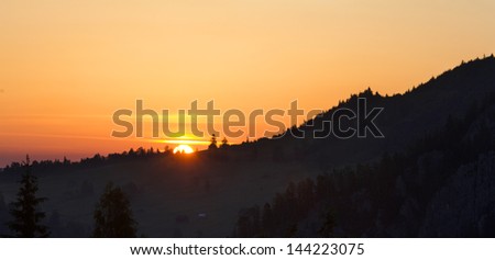 Summer sun rise up in the mountains