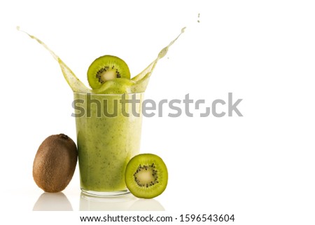 Similar – Image, Stock Photo Green smoothie splashing in glass and flying ingredients at white background with heap of green fruit and vegetable