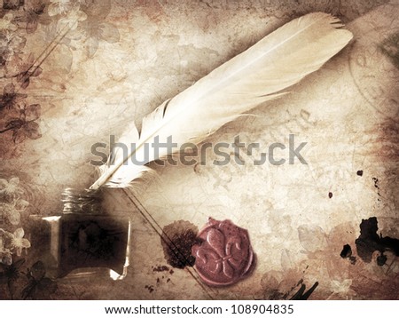 Sepia toned background with old fashioned writing utensils/Writing