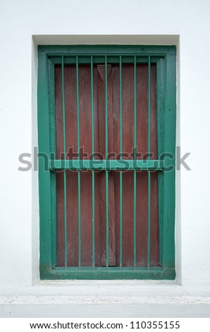 Old wooden green church window