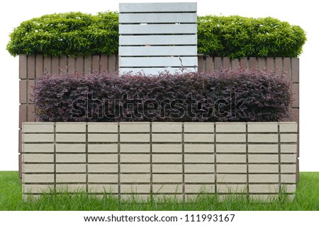 Decorative garden on a brick fence isolated on white background