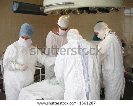 A surgical procedure in an operating room.