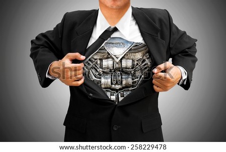 businessman acting like a super hero and tearing his shirt off showing a suit underneath his suit body made from parts gears scrap metal